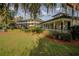 View of two houses with large yards at 16600 Cleveland Ln, Umatilla, FL 32784