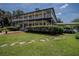 Two-story house with wrap around porch at 16600 Cleveland Ln, Umatilla, FL 32784