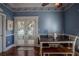 Charming dining area with French doors leading to the backyard at 16600 Cleveland Ln, Umatilla, FL 32784