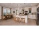 Bright kitchen features an island, table, and stainless steel appliances at 1227 Teal Creek Dr, Saint Cloud, FL 34771