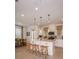 Open concept kitchen with island and breakfast bar seating at 1227 Teal Creek Dr, Saint Cloud, FL 34771