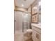 Modern bathroom featuring a walk-in shower and white vanity at 1227 Teal Creek Dr, Saint Cloud, FL 34771