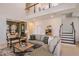 Spacious living room with high ceilings, and a view of the kitchen at 1227 Teal Creek Dr, Saint Cloud, FL 34771