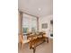 Farmhouse style dining area with wooden table and bench at 1227 Teal Creek Dr, Saint Cloud, FL 34771