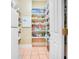 Well-organized pantry with ample shelving for food storage at 1650 Lakehurst Ave, Winter Park, FL 32789
