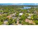 Bird's-eye view showcasing the home and its surroundings; a quiet neighborhood with lake access at 1650 Lakehurst Ave, Winter Park, FL 32789