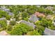 Large home on a tree-lined street, in a neighborhood with many other houses at 1650 Lakehurst Ave, Winter Park, FL 32789