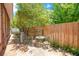 Small patio with wrought iron table and chairs at 1650 Lakehurst Ave, Winter Park, FL 32789