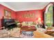 Relaxing living room featuring a piano and comfortable seating at 1650 Lakehurst Ave, Winter Park, FL 32789