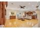 Bright living room with hardwood floors, built-in shelving, and comfortable seating at 1650 Lakehurst Ave, Winter Park, FL 32789