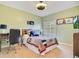 Cozy bedroom with a full-size bed and built-in workspace at 1650 Lakehurst Ave, Winter Park, FL 32789