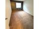 Bright bedroom featuring neutral wall paint and carpet at 2557 N Alafaya Trl # 111, Orlando, FL 32826