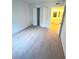Spacious bedroom with neutral carpeting and ample closet space at 2557 N Alafaya Trl # 111, Orlando, FL 32826