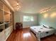 bedroom with built-in shelves and hardwood floors at 349 Bodie St, Longwood, FL 32750