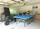 Spacious garage with ping pong table and room for storage at 349 Bodie St, Longwood, FL 32750