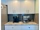 Modern kitchen with granite countertops and updated appliances at 349 Bodie St, Longwood, FL 32750