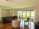 Bright living room featuring hardwood floors and bay window at 349 Bodie St, Longwood, FL 32750