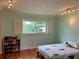 bedroom with built-in shelves and hardwood floors at 349 Bodie St, Longwood, FL 32750