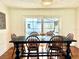 Dining room with sliding glass doors to the pool area at 349 Bodie St, Longwood, FL 32750