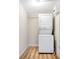 Stackable washer and dryer in a dedicated laundry room at 1500 N Clearview Ave, Deland, FL 32724