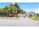 Single story home with driveway and fenced yard at 1500 N Clearview Ave, Deland, FL 32724