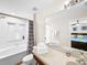 Bathroom with bathtub, shower, and double vanity at 744 La Mirage St, Davenport, FL 33897