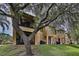 Townhome back patio and row of townhomes with green space at 744 La Mirage St, Davenport, FL 33897