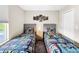 Bedroom with two twin beds and Star Wars bedding at 744 La Mirage St, Davenport, FL 33897