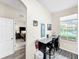 Small breakfast bar with granite countertop and two stools at 744 La Mirage St, Davenport, FL 33897