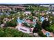 Large pool area with multiple pools and surrounding landscaping at 744 La Mirage St, Davenport, FL 33897