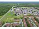 Aerial perspective of the community, highlighting its expansive size and landscape at 744 La Mirage St, Davenport, FL 33897