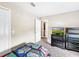 Bedroom with double bed, dresser, and TV at 744 La Mirage St, Davenport, FL 33897