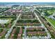 Drone shot showcasing the community's layout and numerous buildings at 744 La Mirage St, Davenport, FL 33897