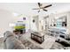 Spacious living room with hardwood floors and open floor plan at 744 La Mirage St, Davenport, FL 33897