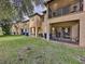 Backyard view of the house showing multiple units at 744 La Mirage St, Davenport, FL 33897