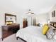 King bed, dresser, closet, home office space at 744 La Mirage St, Davenport, FL 33897