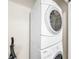 Stackable washer and dryer in convenient laundry closet at 744 La Mirage St, Davenport, FL 33897