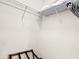 Spacious walk-in closet with wire shelving and hanging rod at 744 La Mirage St, Davenport, FL 33897