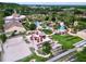 Resort-style pool area with lounge chairs and sand volleyball court at 744 La Mirage St, Davenport, FL 33897