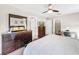 King bed, dresser, closet, home office space at 744 La Mirage St, Davenport, FL 33897