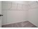 Spacious closet with wire shelving, providing ample storage at 12922 Trovita Dr, Grand Island, FL 32735