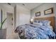 Bedroom with queen bed, and a double door closet at 12922 Trovita Dr, Grand Island, FL 32735