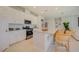 Island kitchen features granite countertops and stainless steel appliances at 12922 Trovita Dr, Grand Island, FL 32735
