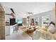 Open living space with kitchen and lake view at 151 N Orlando Ave # 131, Winter Park, FL 32789