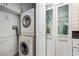 Convenient laundry room with washer and dryer in unit at 151 N Orlando Ave # 131, Winter Park, FL 32789