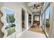 Sunroom with access to other rooms and lake view at 151 N Orlando Ave # 131, Winter Park, FL 32789