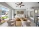 Bright living room featuring a comfy sofa and stylish coffee tables at 151 N Orlando Ave # 131, Winter Park, FL 32789