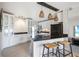Updated kitchen boasts white cabinets and island at 151 N Orlando Ave # 131, Winter Park, FL 32789