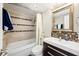 Clean bathroom with tub/shower combo and updated vanity at 151 N Orlando Ave # 131, Winter Park, FL 32789