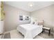 Cozy bedroom with a queen bed and ample natural light at 151 N Orlando Ave # 131, Winter Park, FL 32789